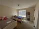 Bedroom with closet space and a window with natural light at 6231 Hickory Lane Cir, Union City, GA 30291