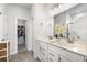 Bright bathroom with double sink vanity, large mirror, and walk-in closet at 1333 Maston Rd, Auburn, GA 30011