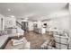 Open-concept living space with a kitchen, dining area, and comfortable seating at 1333 Maston Rd, Auburn, GA 30011