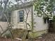 The exterior of the house showcases beige siding and a foundation at 8482 Fairview Dr, Douglasville, GA 30134