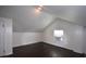 Attic room featuring hardwood floors, a closet, and natural light at 232 Mathewson Sw Pl, Atlanta, GA 30314