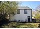 The rear of the home features a small back yard, picnic table, and a door to enter at 232 Mathewson Sw Pl, Atlanta, GA 30314
