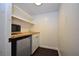 Kitchenette featuring open shelving, mini fridge, and microwave at 232 Mathewson Sw Pl, Atlanta, GA 30314