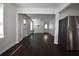 The living room features an open floor plan, light-colored walls, and dark hardwood floors at 232 Mathewson Sw Pl, Atlanta, GA 30314