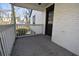 This porch has wooden floors, white railings and a white painted brick wall at 232 Mathewson Sw Pl, Atlanta, GA 30314