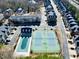 Overhead shot displaying the pool and tennis courts for this townhome community at 2349 Harshaw Ave, Lawrenceville, GA 30043