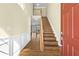 Inviting foyer features hardwood floors and a staircase leading to the upper level at 2349 Harshaw Ave, Lawrenceville, GA 30043