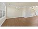 Sun-filled living room with hardwood floors, neutral paint, and ample space for entertaining at 2349 Harshaw Ave, Lawrenceville, GA 30043