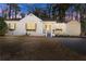 Charming home with a well-manicured lawn and a paved driveway at 1428 Pinehurst Sw Dr, Atlanta, GA 30311