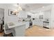Well-lit modern kitchen with stainless steel appliances and quartz countertops at 1428 Pinehurst Sw Dr, Atlanta, GA 30311