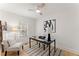 Bright office space featuring a modern desk, a comfortable chair, and natural light, creating an ideal work environment at 1428 Pinehurst Sw Dr, Atlanta, GA 30311