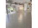 Spacious two-car garage featuring epoxy floors at 1558 Amberwood Creek Nw Dr, Kennesaw, GA 30152