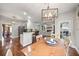 Open floorplan kitchen with eat-in area and seamless flow to living room at 1558 Amberwood Creek Nw Dr, Kennesaw, GA 30152