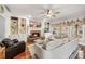 Comfortable living room featuring a fireplace and large sectional seating at 1558 Amberwood Creek Nw Dr, Kennesaw, GA 30152