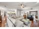 Inviting living area featuring hardwood floors and a comfortable sectional sofa at 1558 Amberwood Creek Nw Dr, Kennesaw, GA 30152