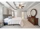 This main bedroom offers a spacious layout, neutral décor, and an ensuite bathroom for optimal comfort at 1558 Amberwood Creek Nw Dr, Kennesaw, GA 30152