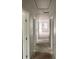 Hallway view showcasing multiple doors and access to other rooms at 5385 Booker T Dr, Morrow, GA 30260