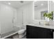 Modern bathroom features a walk-in glass shower and sleek vanity at 788 W Marietta Nw St # 116, Atlanta, GA 30318