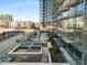 Contemporary high-rise with balconies, lush landscaping, and a vibrant city view at 788 W Marietta Nw St # 116, Atlanta, GA 30318