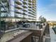 View of the modern Seven88 high-rise building with balconies and rooftop terrace at 788 W Marietta Nw St # 116, Atlanta, GA 30318