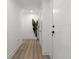 Hallway with plenty of natural light and a plant decoration at 788 W Marietta Nw St # 116, Atlanta, GA 30318