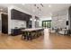 Modern kitchen with breakfast bar, sleek cabinetry, and open layout to living space at 788 W Marietta Nw St # 116, Atlanta, GA 30318