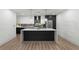 Contemporary kitchen featuring an island with modern lighting, stainless steel appliances, and sleek cabinetry at 788 W Marietta Nw St # 116, Atlanta, GA 30318