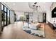 Stylish lounge space with modern seating, chic lighting, and floor-to-ceiling windows at 788 W Marietta Nw St # 116, Atlanta, GA 30318
