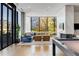 Bright lounge features floor to ceiling windows, comfortable seating and pool table at 788 W Marietta Nw St # 116, Atlanta, GA 30318