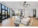 Resident lounge with modern furniture, a stylish rug, and floor-to-ceiling windows at 788 W Marietta Nw St # 116, Atlanta, GA 30318