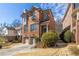 Beautiful brick home featuring a two-car garage and manicured front yard at 2348 Loraine Ne St, Atlanta, GA 30319