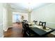 An open-concept dining area features seating for six with clear sightlines to living area at 2974 Michelle Lee Dr, Dacula, GA 30019