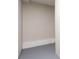Finished section of basement with neutral paint, flooring and lighting at 5199 Mainstreet Park Dr, Stone Mountain, GA 30088