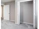 Bedroom with a closet and carpeted flooring at 5199 Mainstreet Park Dr, Stone Mountain, GA 30088