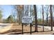 Mainstreet Clubhouse signage with private parking at 5199 Mainstreet Park Dr, Stone Mountain, GA 30088