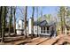 Residential home featuring a screened porch at 5199 Mainstreet Park Dr, Stone Mountain, GA 30088
