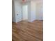 Spacious bedroom with wood floors and multiple doors at 1883 Bennett Rdg, Snellville, GA 30078