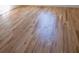 Close-up of light wood flooring, highlighting the natural grain and finish at 1883 Bennett Rdg, Snellville, GA 30078