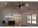 Bright, open-concept living area with modern kitchen, hardwood floors, and natural light at 1883 Bennett Rdg, Snellville, GA 30078