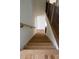 Hardwood staircase features natural wood steps and black iron railings at 1883 Bennett Rdg, Snellville, GA 30078