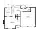 First floor layout showcasing an open-concept kitchen, dining, and living area with access to a patio and garage at 5589 Claridge Cir, Lithonia, GA 30038