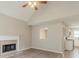 Bright living room with vaulted ceilings, fireplace, and open access to the modern kitchen at 5589 Claridge Cir, Lithonia, GA 30038