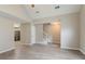 Open-concept living space featuring wood-look floors, vaulted ceilings, and easy access to the kitchen at 5589 Claridge Cir, Lithonia, GA 30038