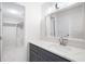Well-lit bathroom features a large mirror, marble counters, and a walk-in closet at 1307 Wynnes Ridge Se Cir, Marietta, GA 30067