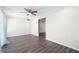 Empty bedroom features hardwood floors, ceiling fan, and ample natural light at 1307 Wynnes Ridge Se Cir, Marietta, GA 30067