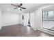 Bedroom with wood floors, ceiling fan, and many windows for ample natural light at 1307 Wynnes Ridge Se Cir, Marietta, GA 30067
