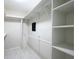 Spacious walk-in closet with custom shelving and ample storage space, perfect for organization at 1307 Wynnes Ridge Se Cir, Marietta, GA 30067