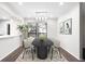 Elegant dining room featuring a modern chandelier and spacious seating, ideal for Gathering gatherings at 1307 Wynnes Ridge Se Cir, Marietta, GA 30067