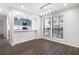 Open-concept dining area with hardwood floors and a large window, perfect for entertaining guests at 1307 Wynnes Ridge Se Cir, Marietta, GA 30067