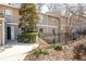 Inviting condo exterior featuring a fenced yard and neutral siding, perfect for low-maintenance living at 1307 Wynnes Ridge Se Cir, Marietta, GA 30067